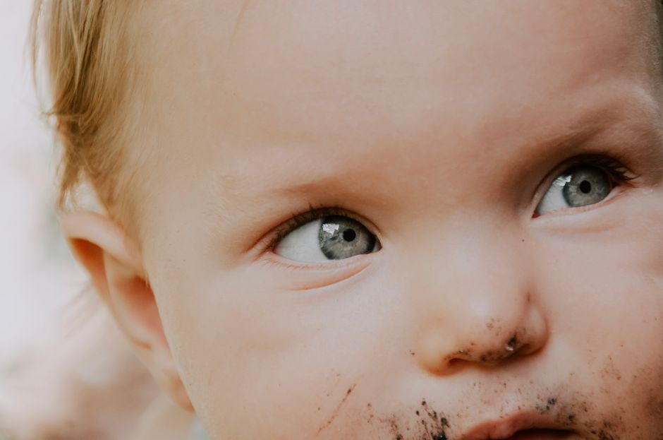 Candid close-up of baby with expressive eyes