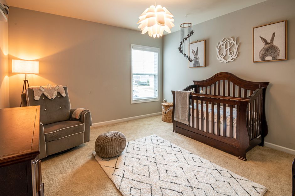 A modern, beautifully childproofed nursery space free of cord hazards