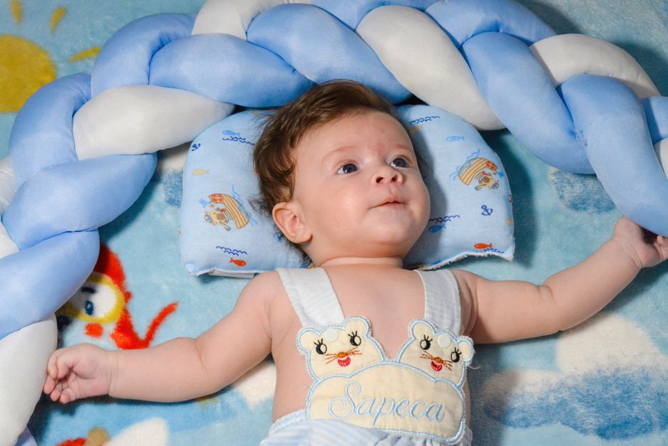 Cozy minimalist baby bedding and essentials in a well-organized nursery