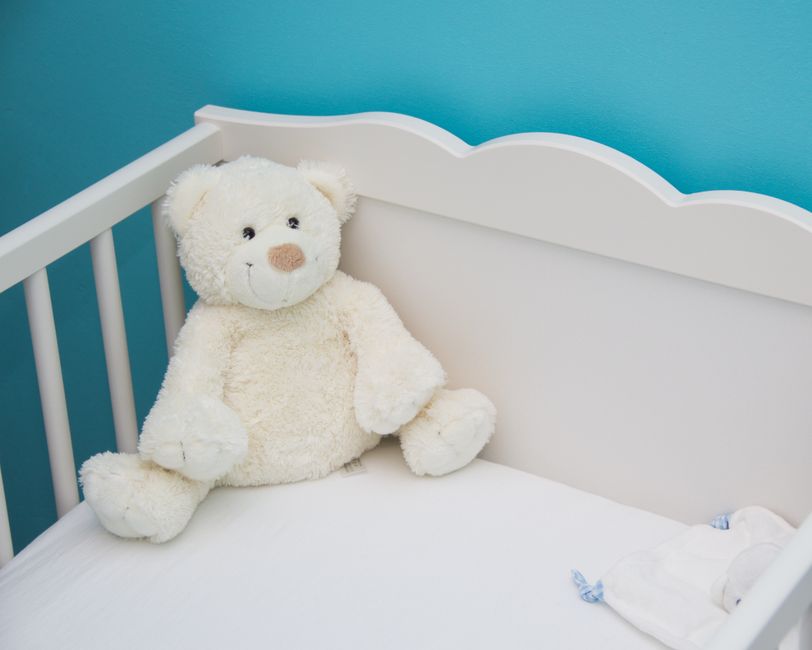 Mother with newborn baby in nursery