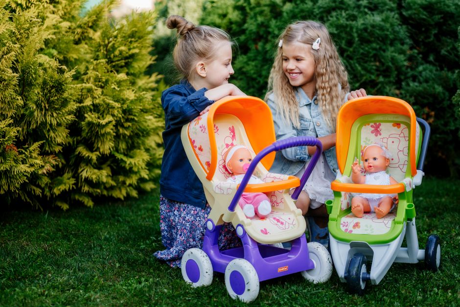 Stroller parked safely in shaded park during outdoor walk