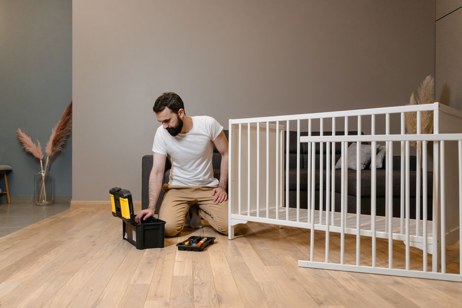 Assembling and securely anchoring nursery furniture to wall studs