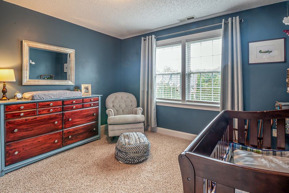 Safe and charming modern nursery with secure layout and ample natural light