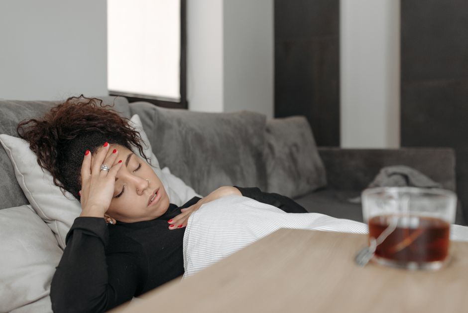 Woman resting comfortably while recovering during the fourth trimester