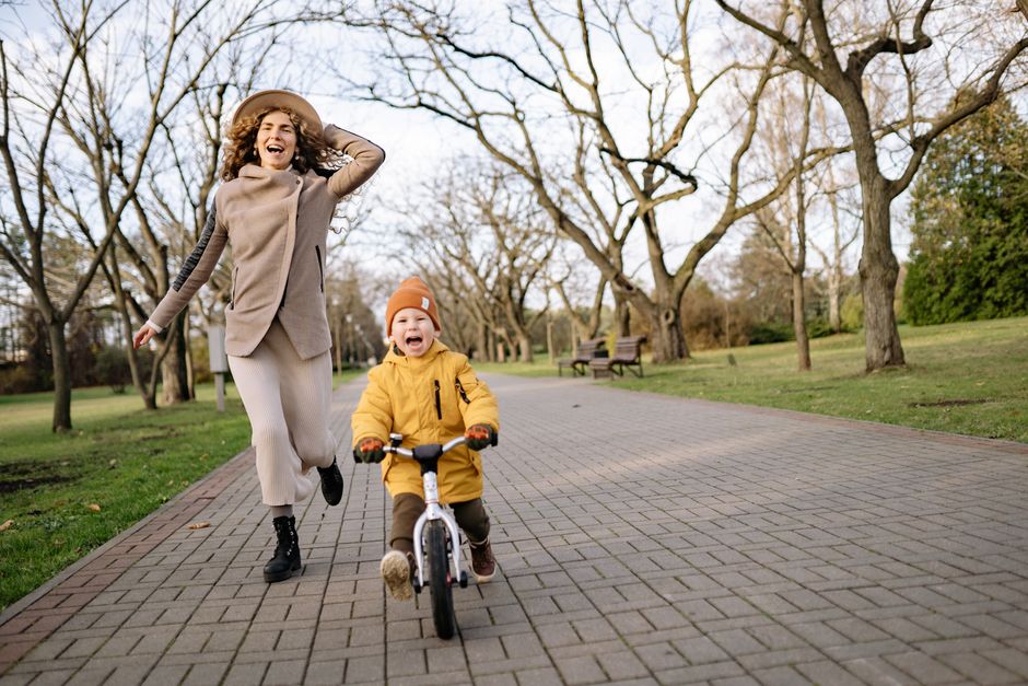 A happy toddler boy playing outdoors, capturing the freedom and energy of childhood