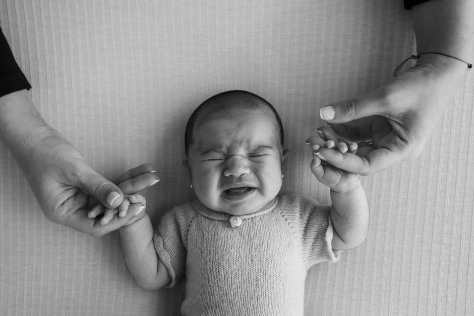 Peaceful sleeping baby resting safely in a crib