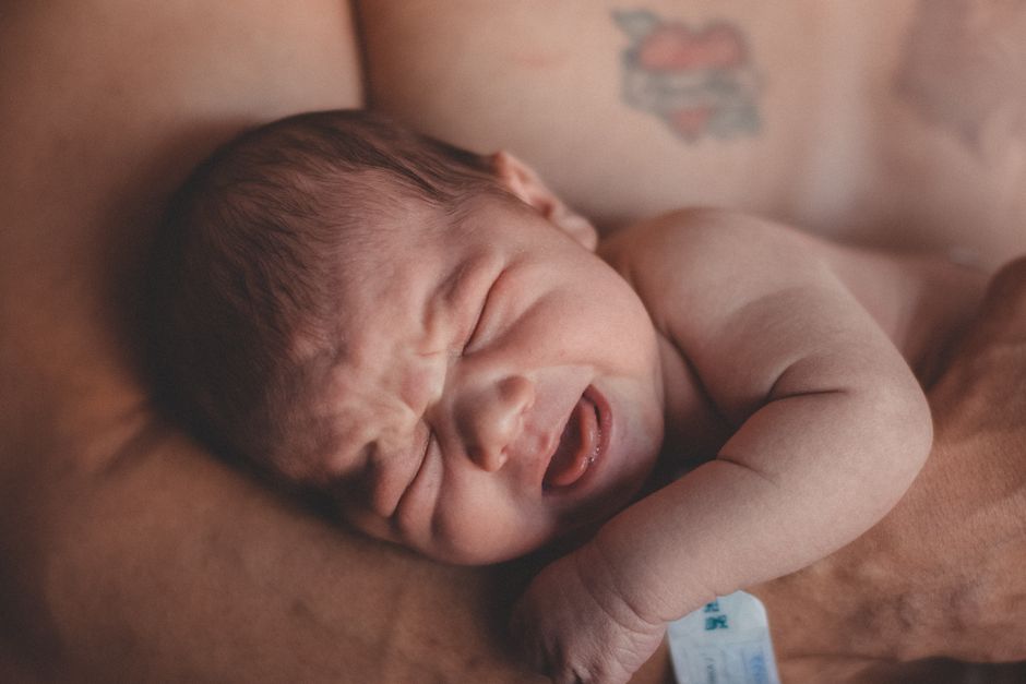 Mother calmly connecting and soothing her baby
