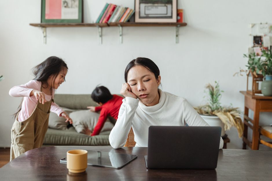 Mother balancing daily tasks while experiencing mental fatigue