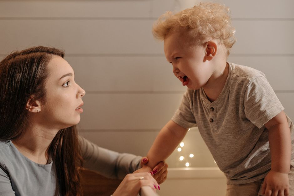 Mother and son sharing a quiet moment in a cozy room