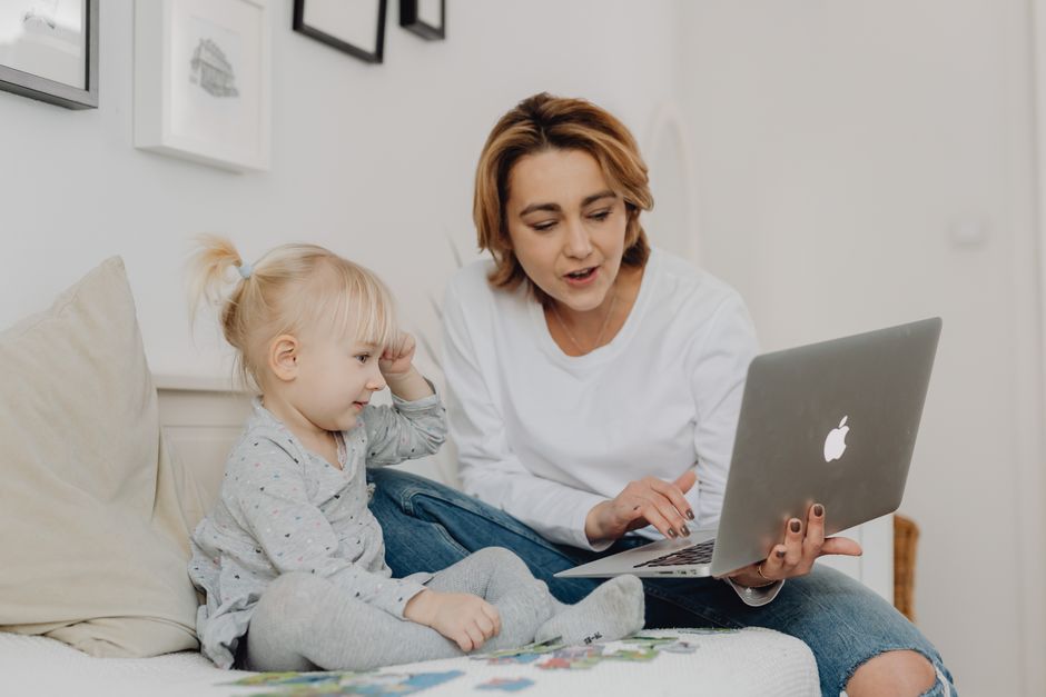 Mother and daughter enjoying quality time together in a warm living room