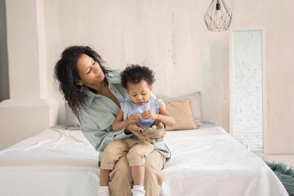 Mother and toddler enjoying connection in cozy room